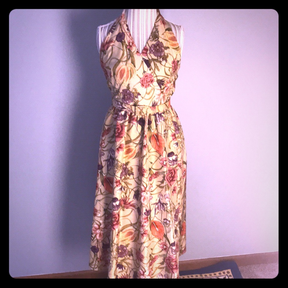 100% Silk floral halter dress with belt. Size 6